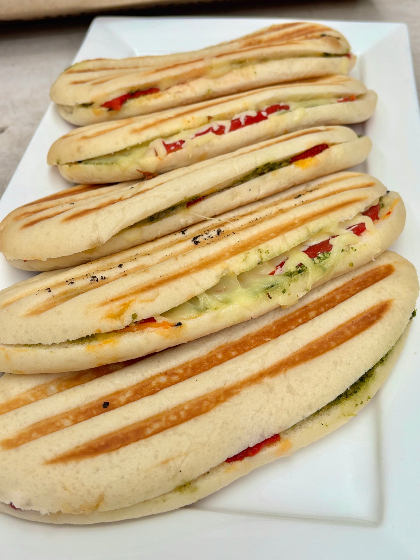Pesto, Mozzarella + red pepper panini