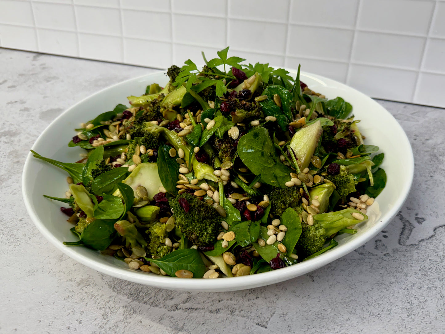 Roasted broccoli cranberry spinach salad